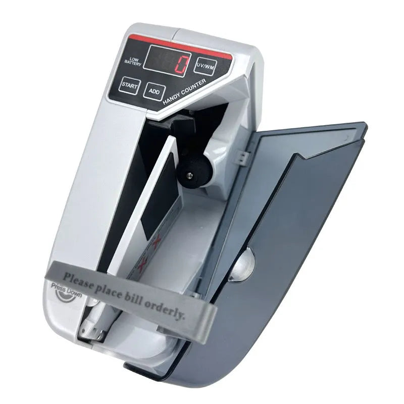 V31 foreign currency counting machine with purple light banknote verification and LED display on desk