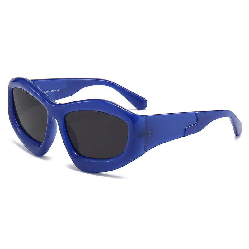 Concave shape sunglasses with bubble lens in multiple colour combinations including black, blue, red and yellow.