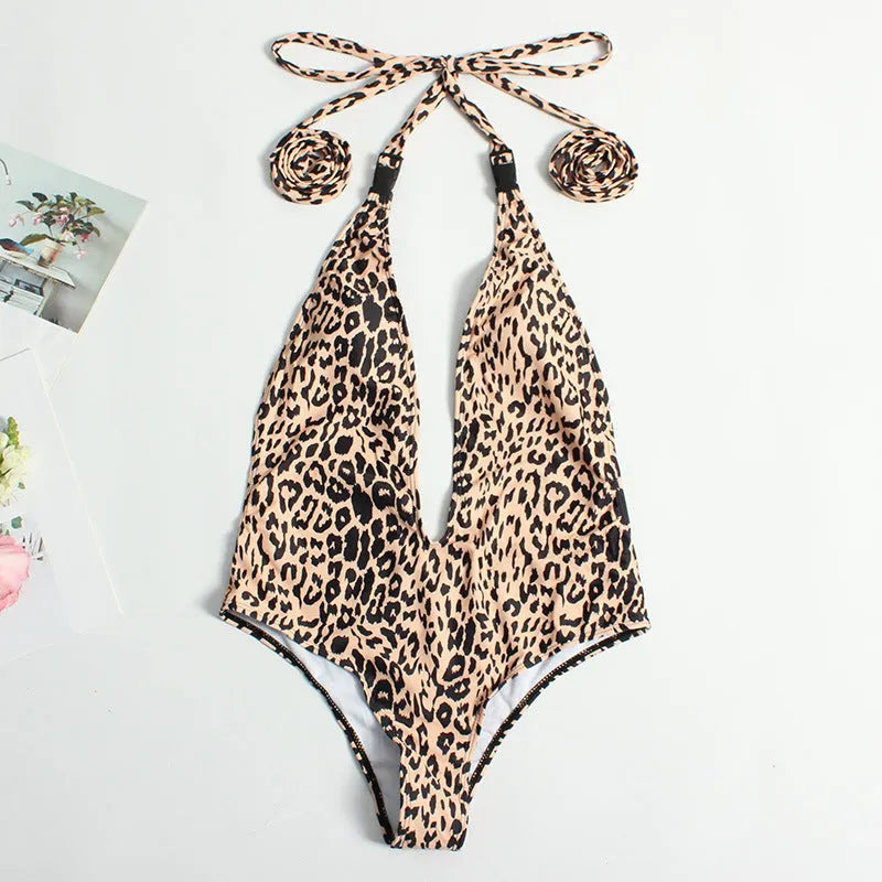Women's leopard print one-piece swimsuit with buckle bandage detailing and backless design