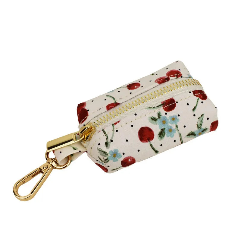Red cherry printed cloth dog collar with light gold buckle and detachable bow strap
