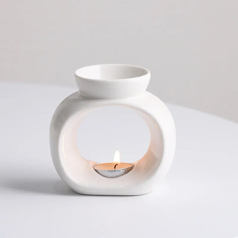 White Nordic style porcelain aromatherapy stove ornament on plain background