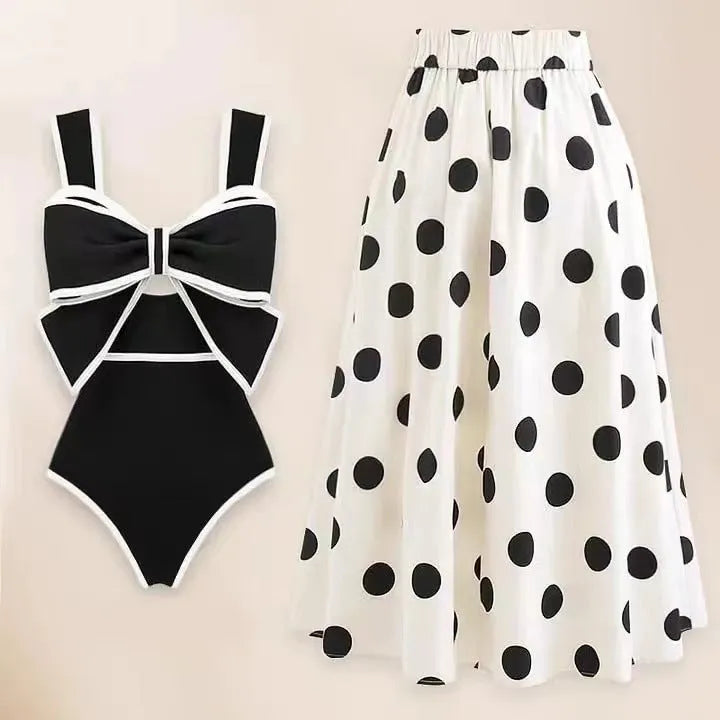 Women's black one-piece swimsuit with white bow and round skirt beach dress design