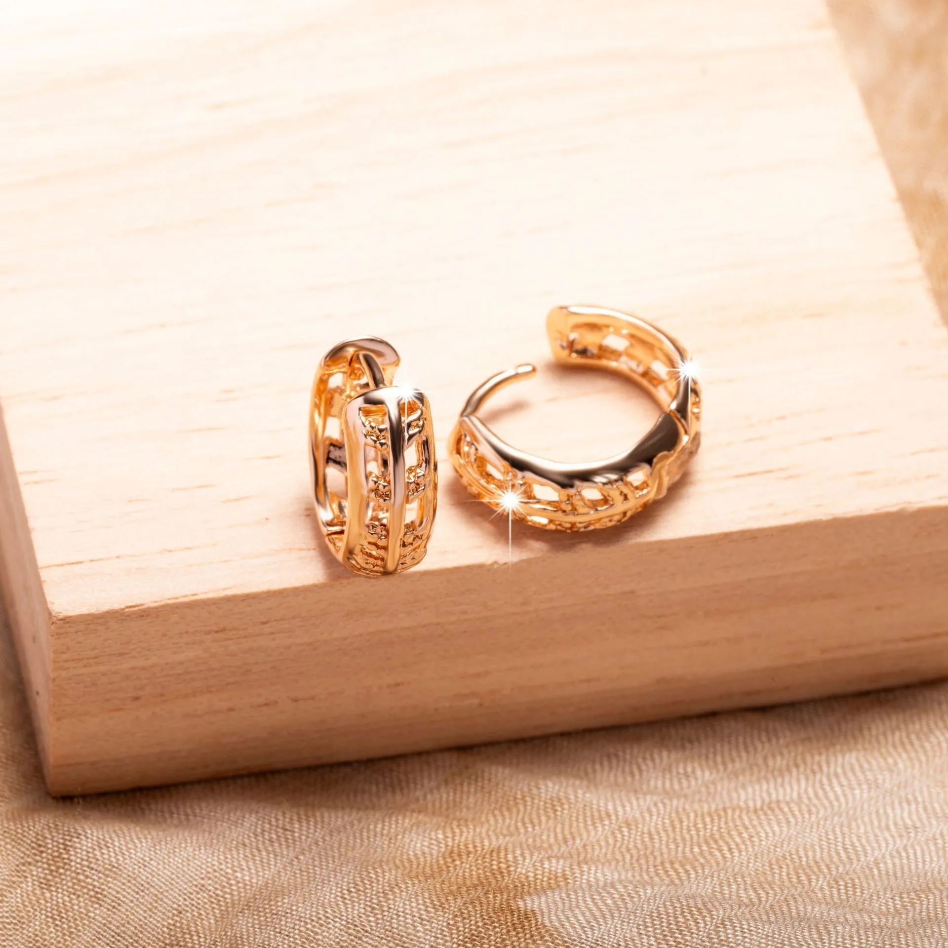 Rose gold copper earrings with hollowed-out leaf design featuring heart shape details