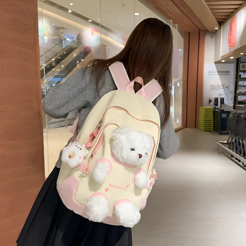 Literary style school backpack in macaron colours with curved shoulder straps and 20-35L capacity