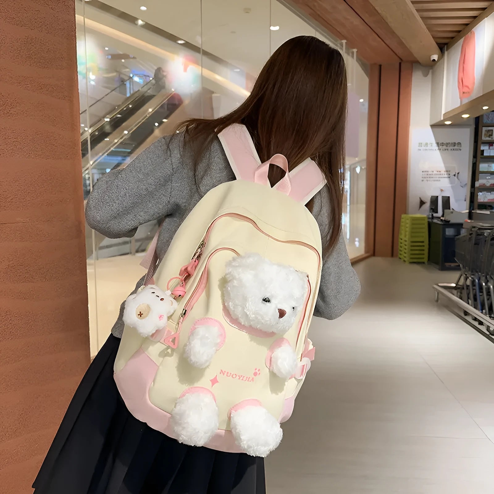 Literary style school backpack in macaron colours with curved shoulder straps and 20-35L capacity