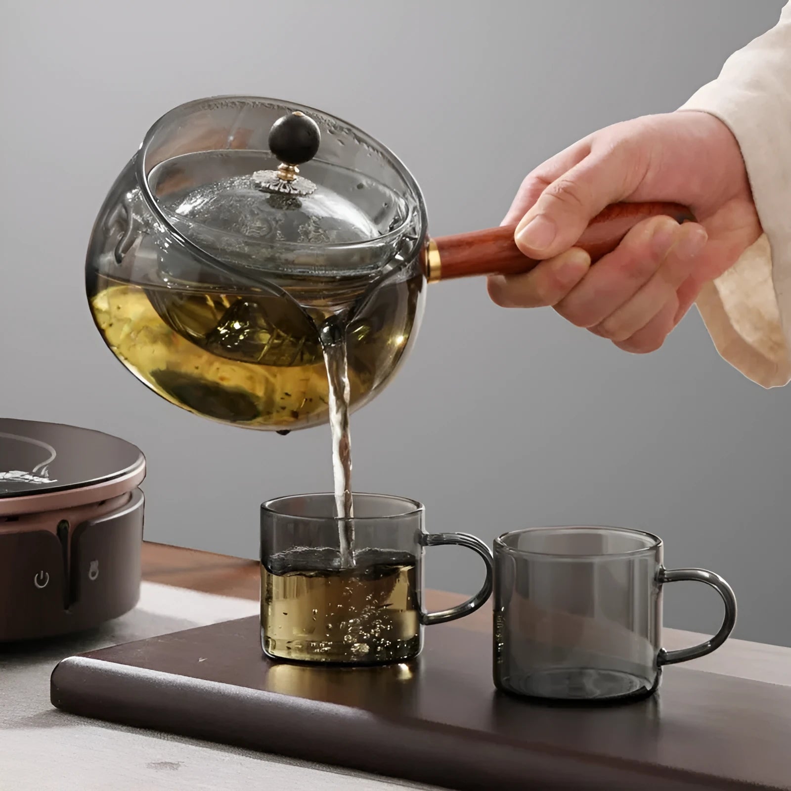 Semi-automatic rotary glass teapot with wooden handle and infuser in transparent borosilicate glass