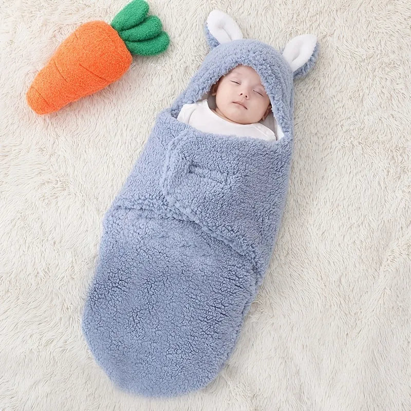 Fluffy fleece baby sleeping bag swaddle in blue with adjustable hook-and-loop closure for newborn
