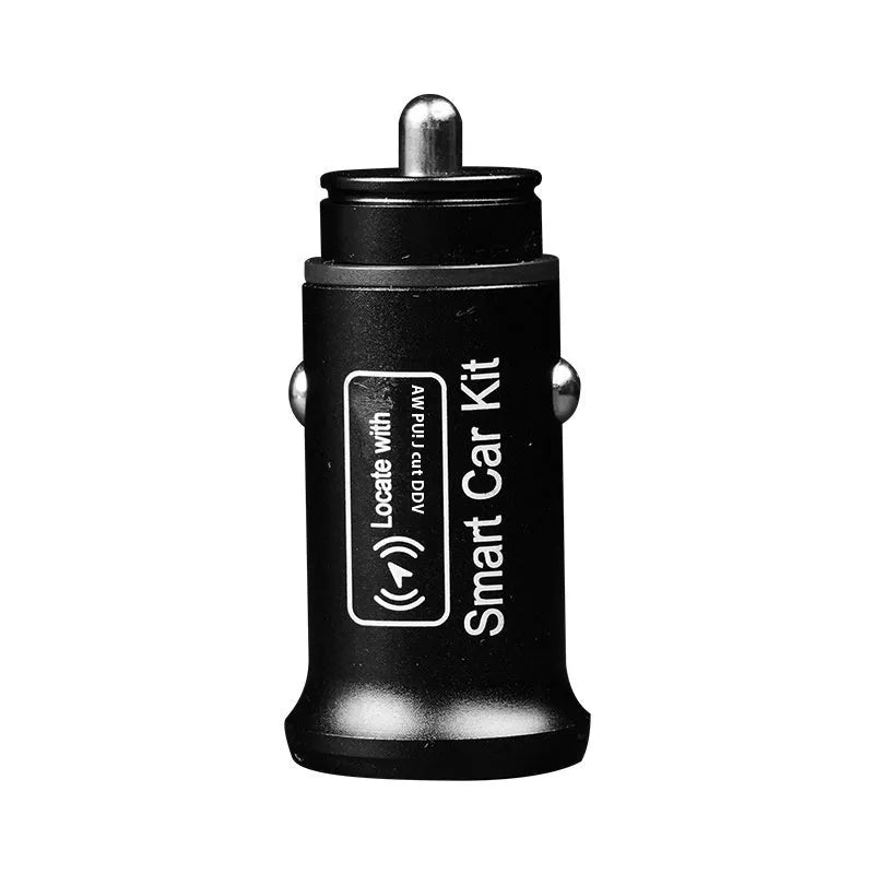 Black ABS plastic car charger locator GPS setting instrument on a dark surface.