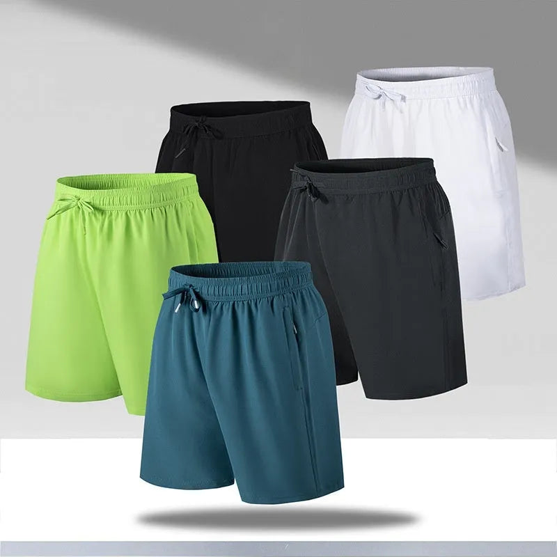 Men's loose fit quick-dry sports shorts in polyester fibre available in multiple colours and sizes