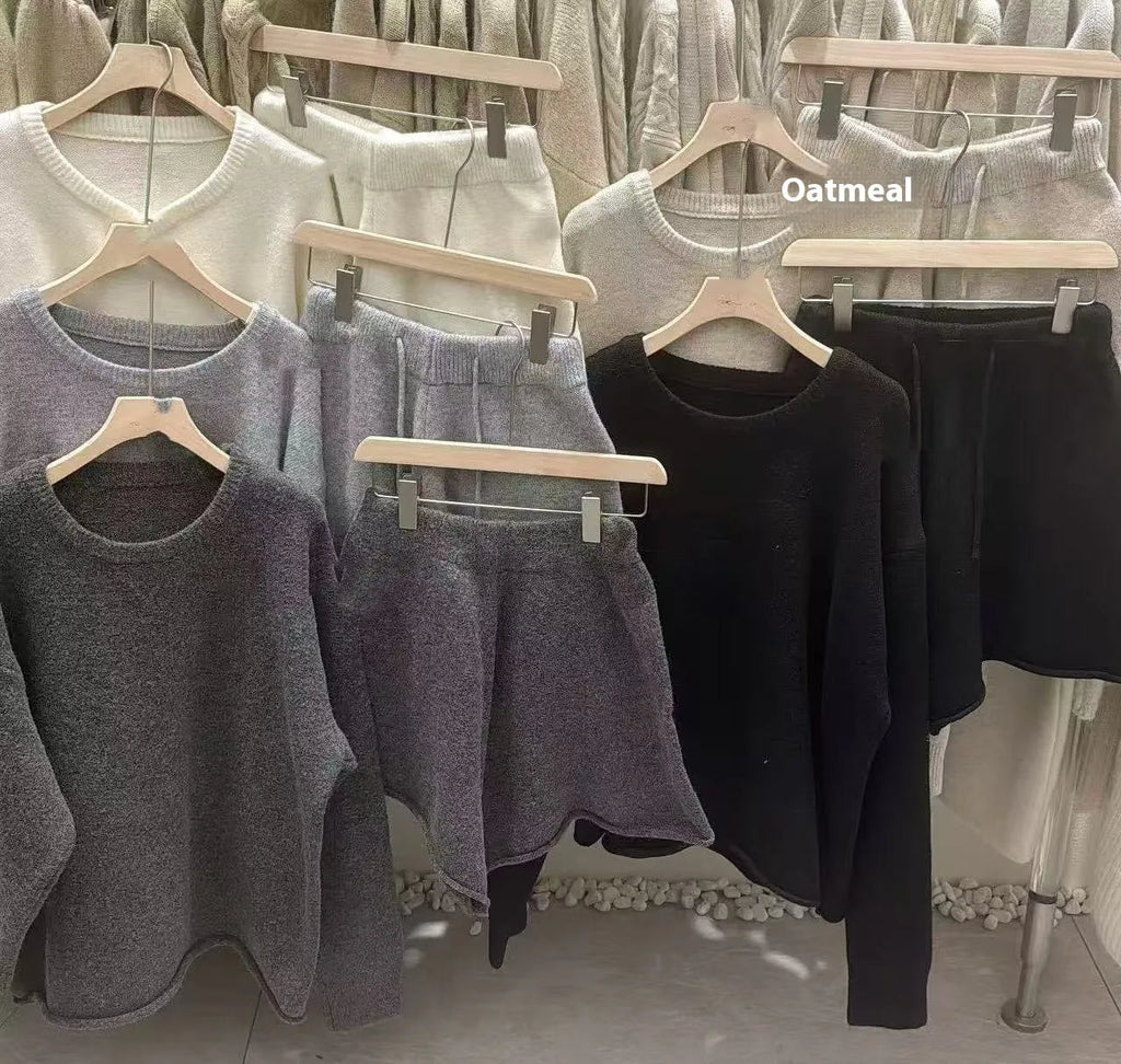 Women's loose-fit long sleeve sweater and knitted wide-leg shorts two-piece set in oatmeal colour.