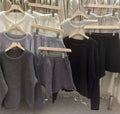 Women's loose-fit long sleeve sweater and knitted wide-leg shorts two-piece set in oatmeal colour.