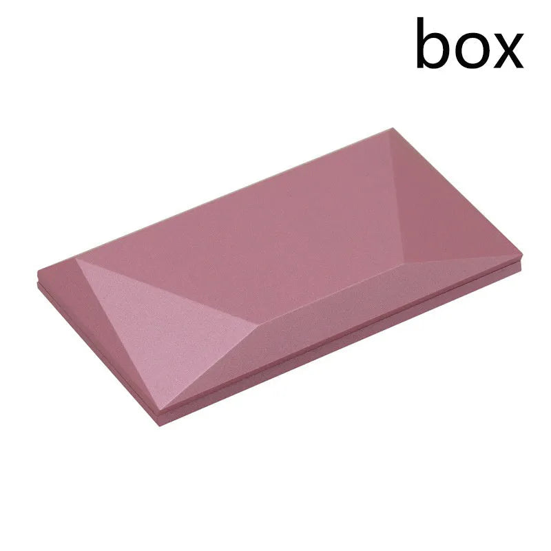 Red heart-shaped rotating plastic ring box for jewellery presentation