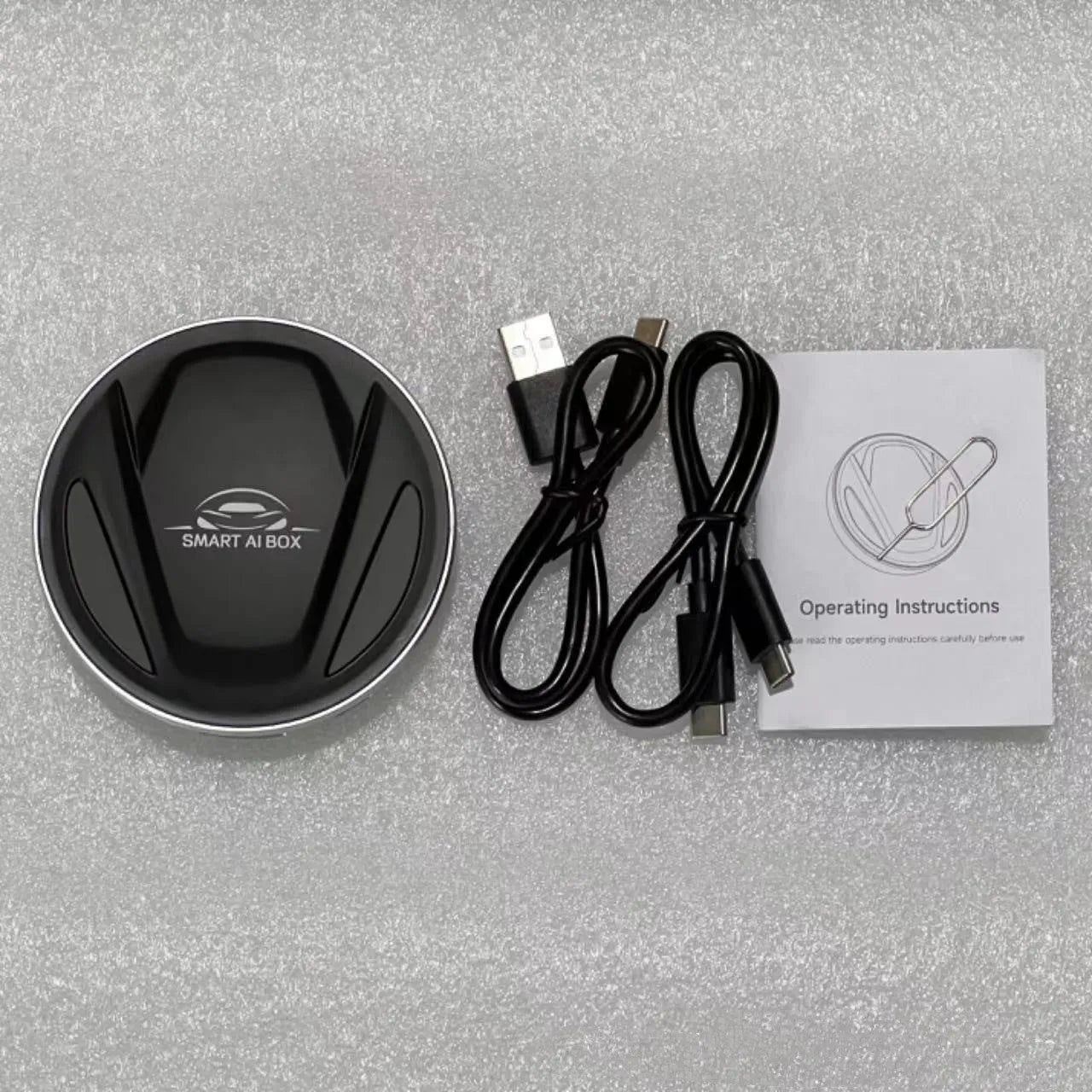 Black plastic CarPlay Android Auto conversion box with data cable for factory head unit smartphone integration