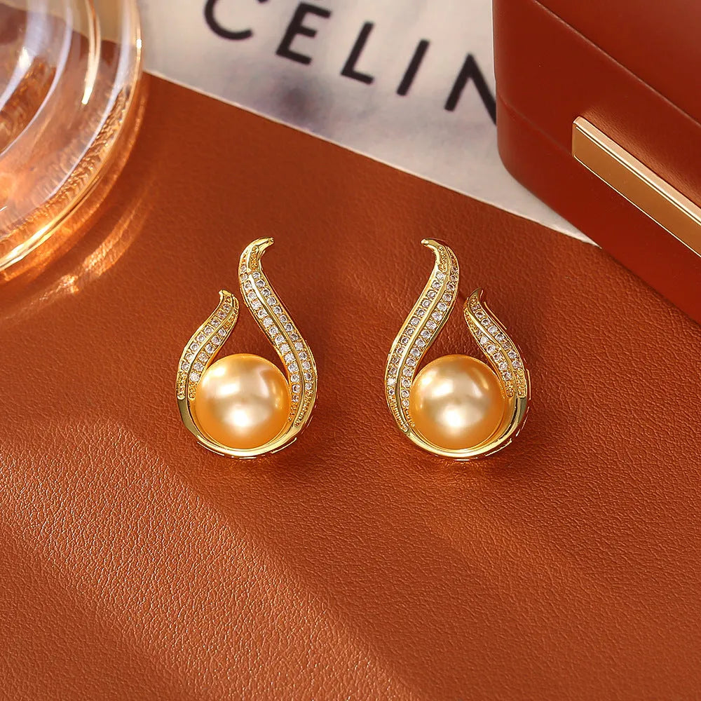 Glass pearl stud earrings with real gold plating on copper base, four colour options round geometric style