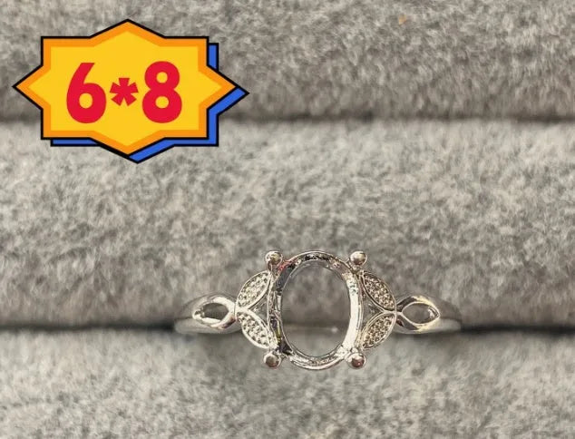 Oval denier ring with open mouth design, 6*8mm stone, and five-pointed star decoration