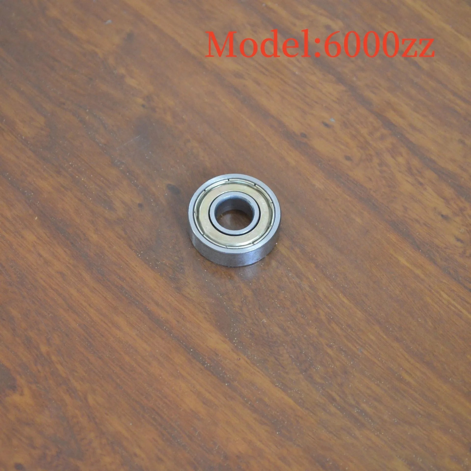 6000ZZ carbon steel deep groove ball bearing with metal shields, dimensions 10mm inner diameter by 26mm outer diameter.