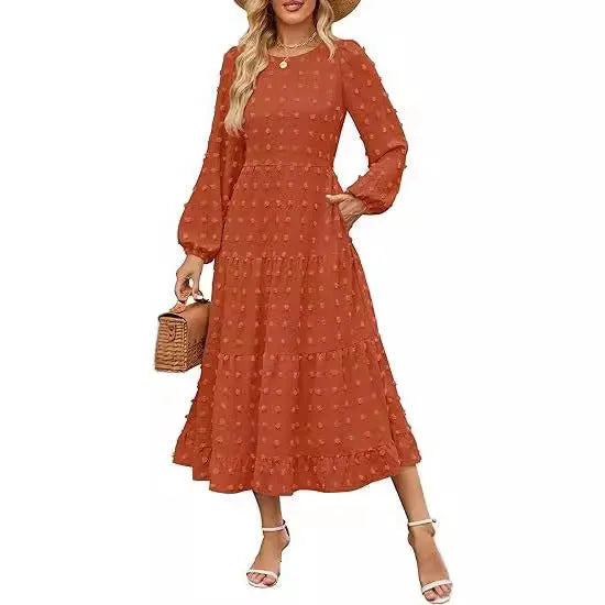 Long sleeve casual dress with round neck, high waist, and ruffle sleeves in a solid colour.