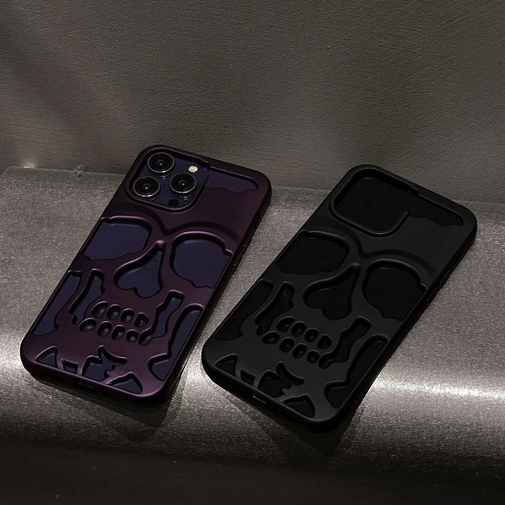 Frosted skull TPU phone case in matte black for iPhone 14 Pro showing hollow skull design