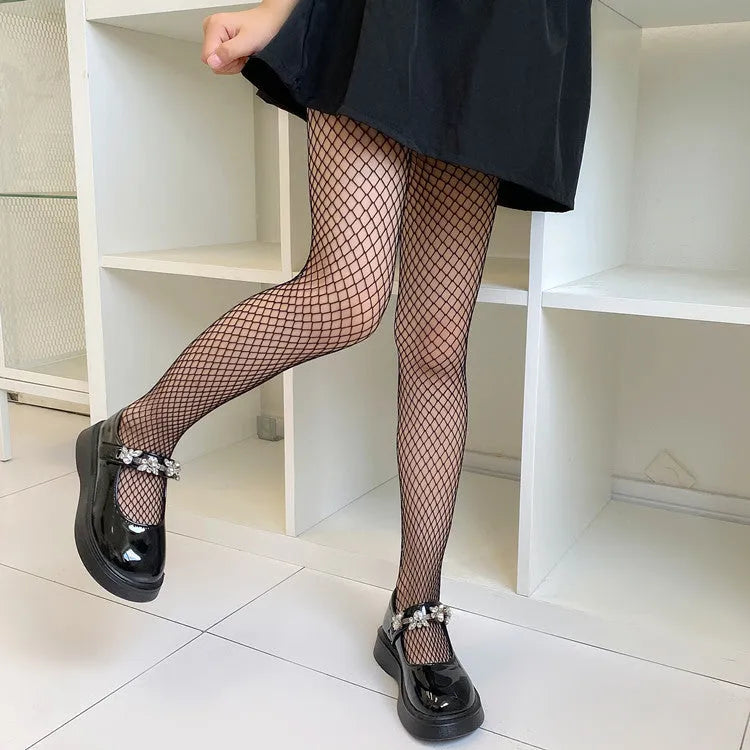Women's sheer mesh pantyhose showing large, medium and small pattern options in black and white colours