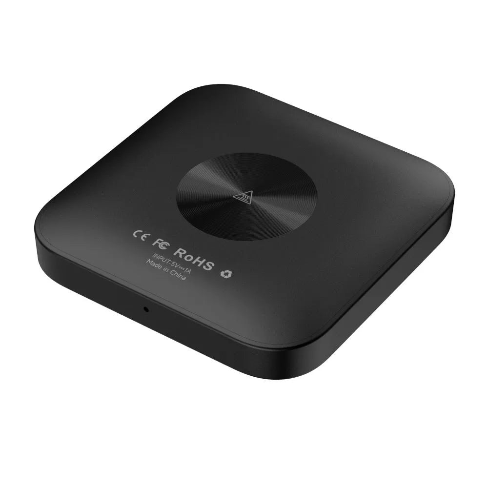 Square Tbox-Led Wireless CarPlay adapter dongle for cars with factory wired CarPlay systems.