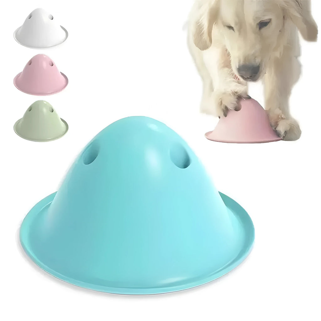 Green hidden treat dog chew toy with snack slots on a smooth surface for interactive puzzle play