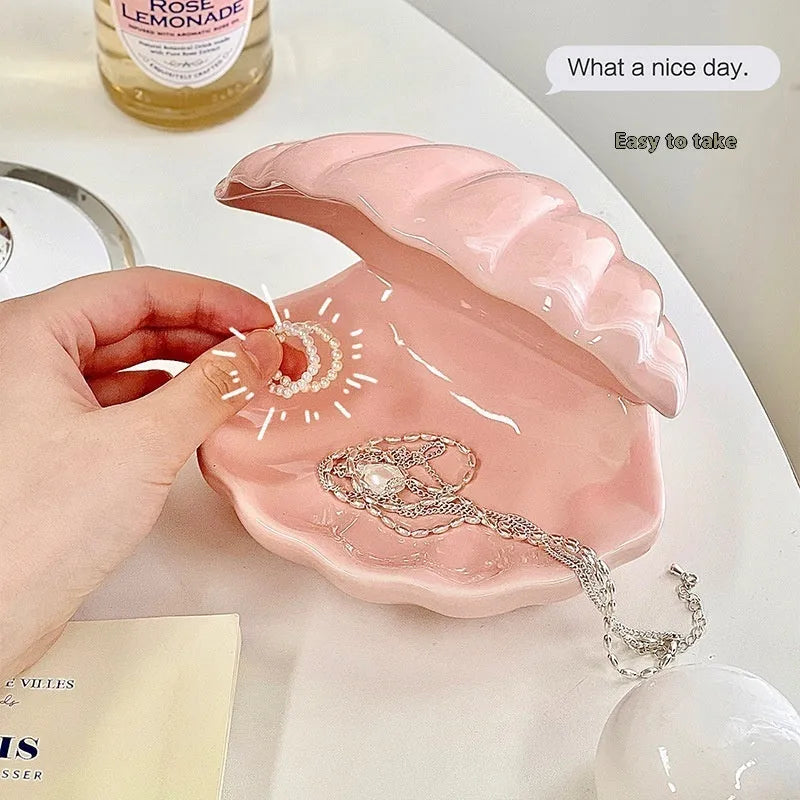 A white porcelain tray with a matching small night light, in pink or white, for a girl's bedroom.