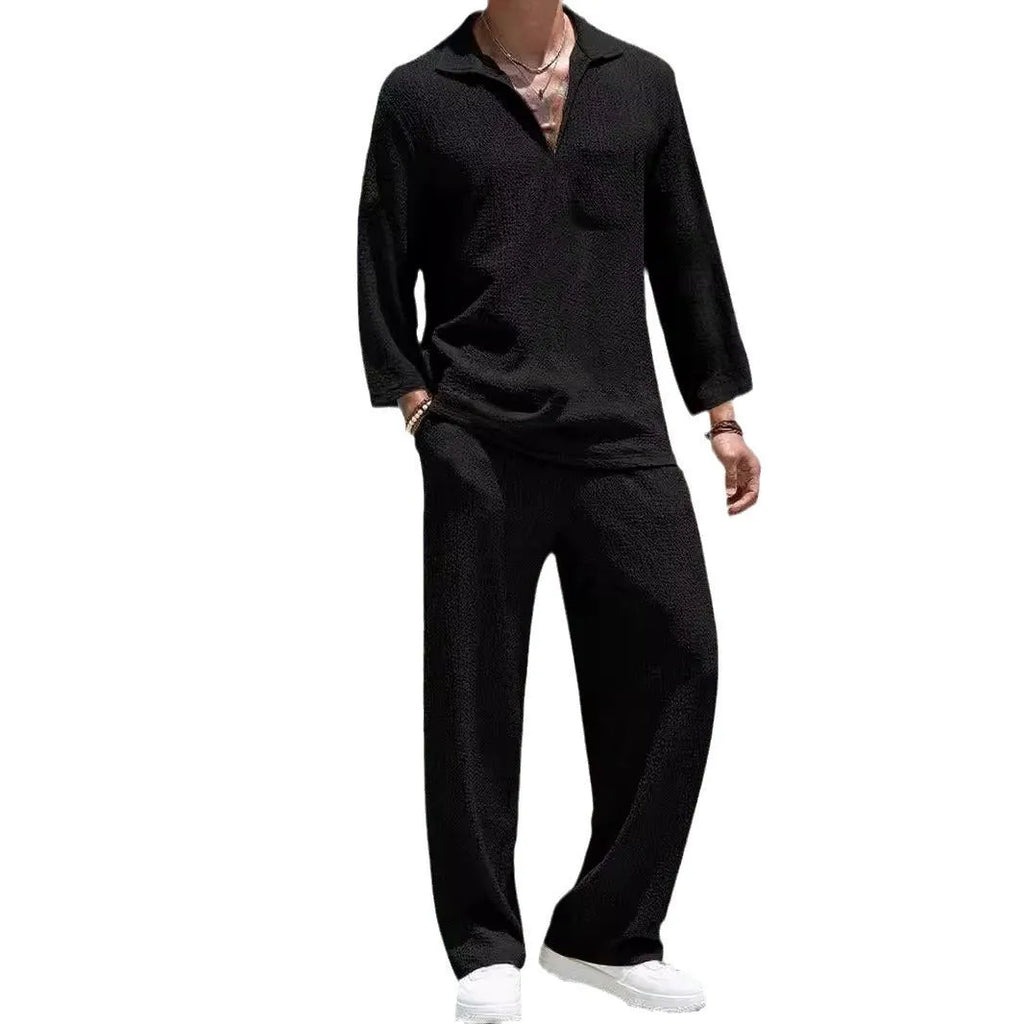 Men's casual polyester commuter suit in lake blue, showing shirt jacket and trousers laid flat.