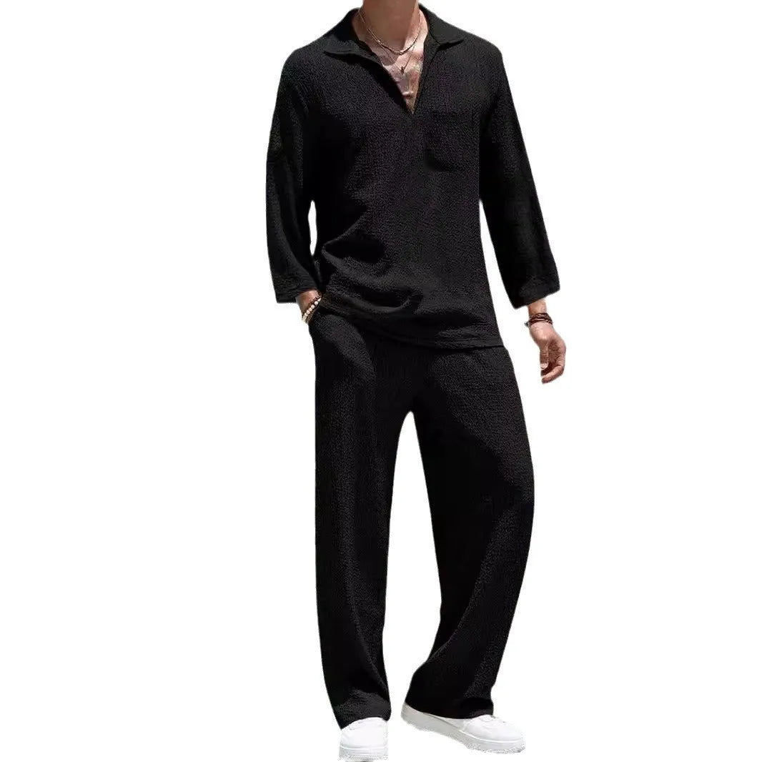 Men's casual polyester commuter suit in lake blue, showing shirt jacket and trousers laid flat.