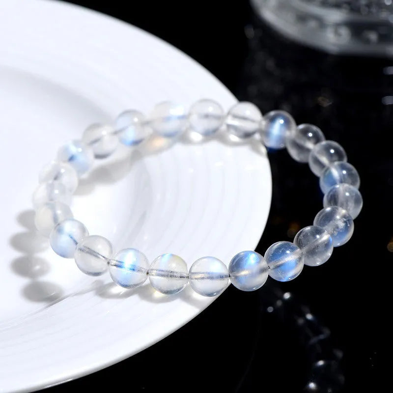Natural cream body blue moonlight crystal bracelet showing grinding treatment details