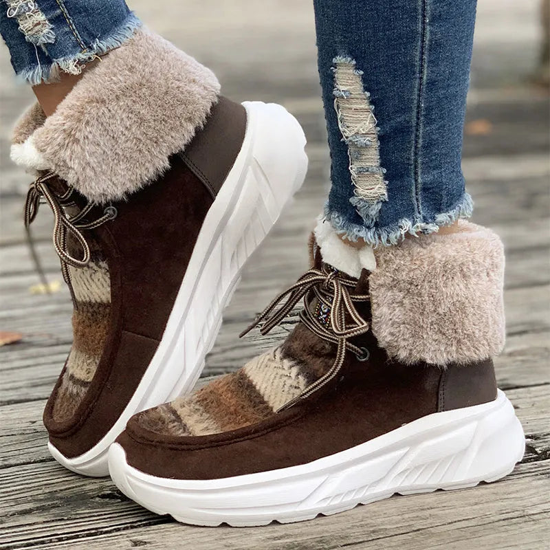 Beige women's lace-up suede snow boots with a fuzzy lining and thick rubber sole.