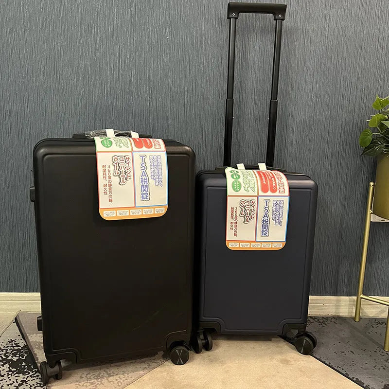 Ultra-light mute universal wheel draw-bar luggage in ABS PC material, 20 inch, black colour, shown on floor