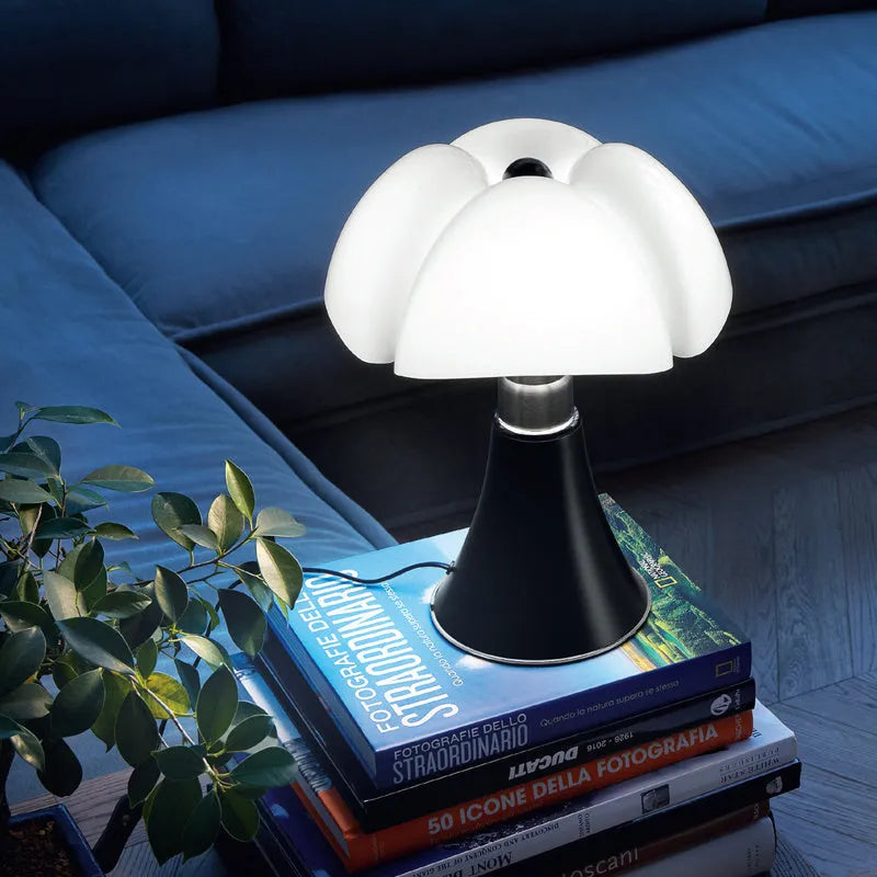 Italian retro style flower table lamp on a bedside table in a choice of colours.