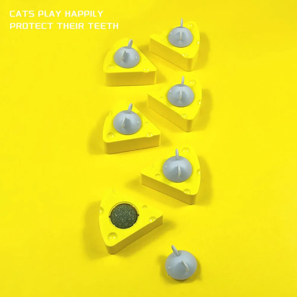 Yellow catnip and silvervine chew balls for cat teeth cleaning and play
