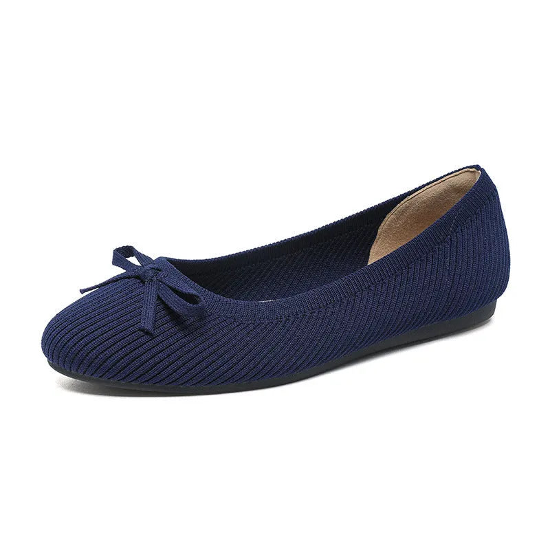 Women's round toe fabric flat pumps with bow decoration in butterfly black colour