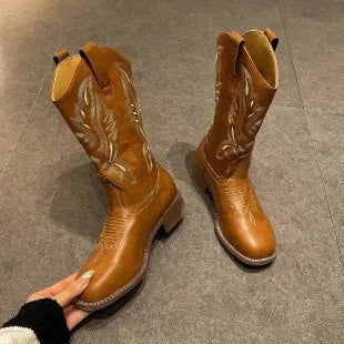Brown women's embroidered mid-calf Martin boots with a low square heel and round toe.