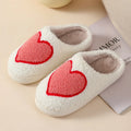 Womens plush cartoon slippers with a round toe and non-slip PVC sole in various colour designs.