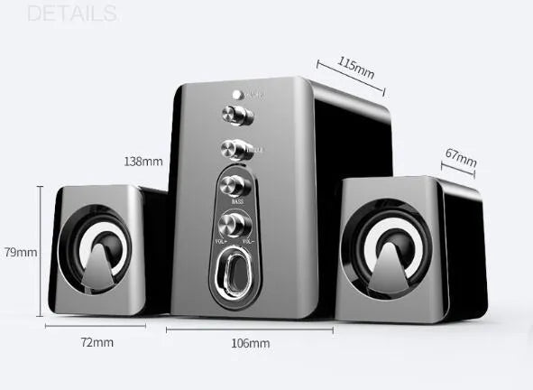 Mini black and white USB-powered 2.1 computer speaker system with subwoofer on a desktop.
