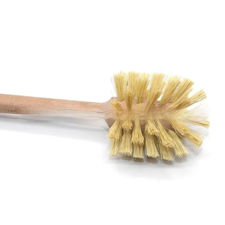 Large long handle cleaning brush with beech wood handle and natural sisal bristles on a wooden surface