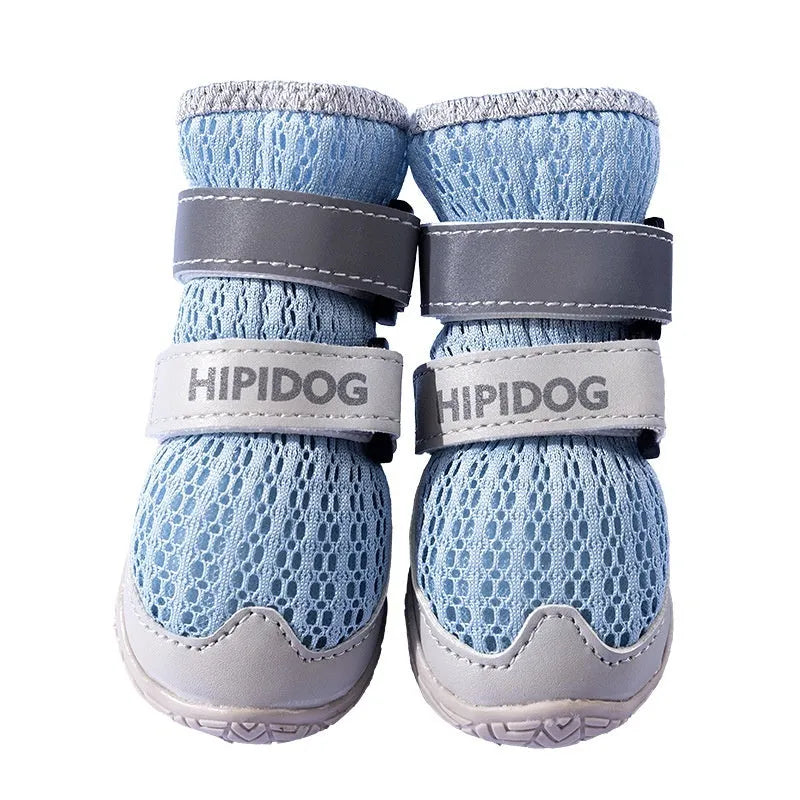 Blue and green cartoon-style breathable dog shoes for summer on a white background.