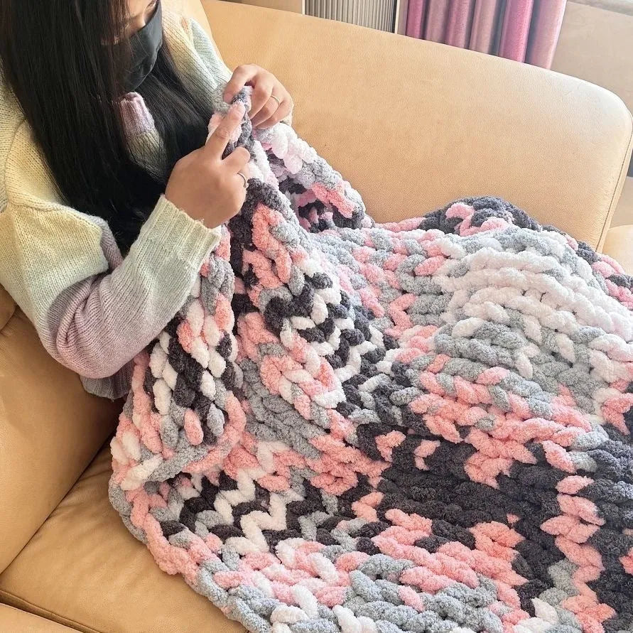 Coarse yarn chenille knitted blanket with braided gravity design in multiple colour options