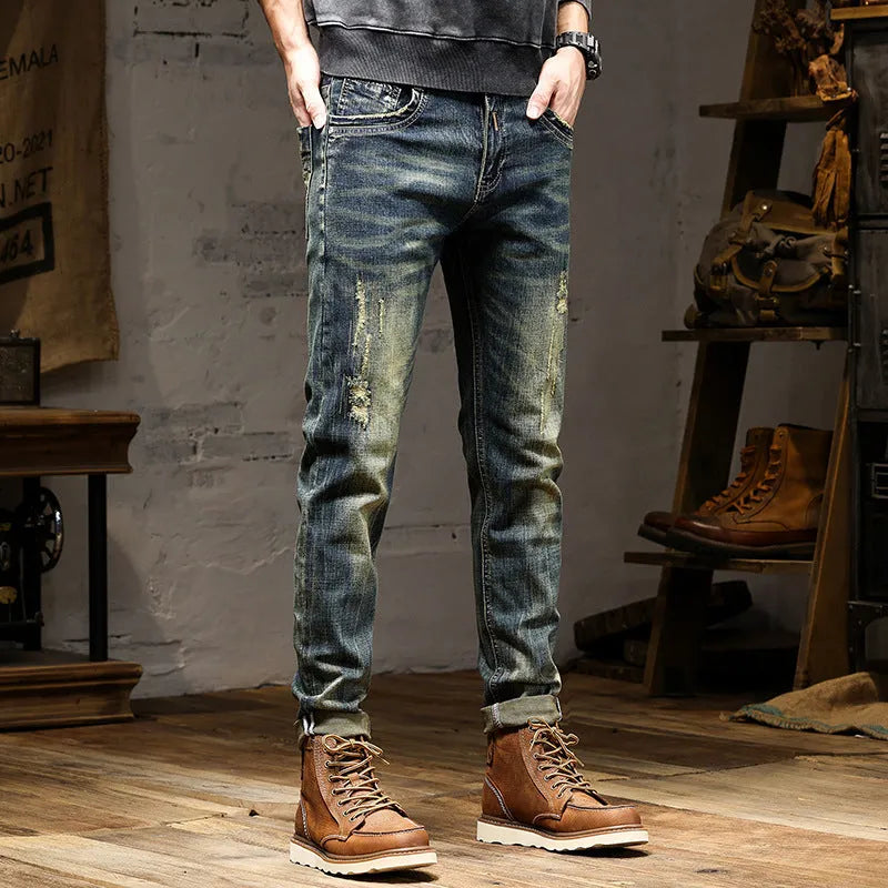 Men's retro blue jeans with stretch fabric in skinny fit style showing zip fly detail