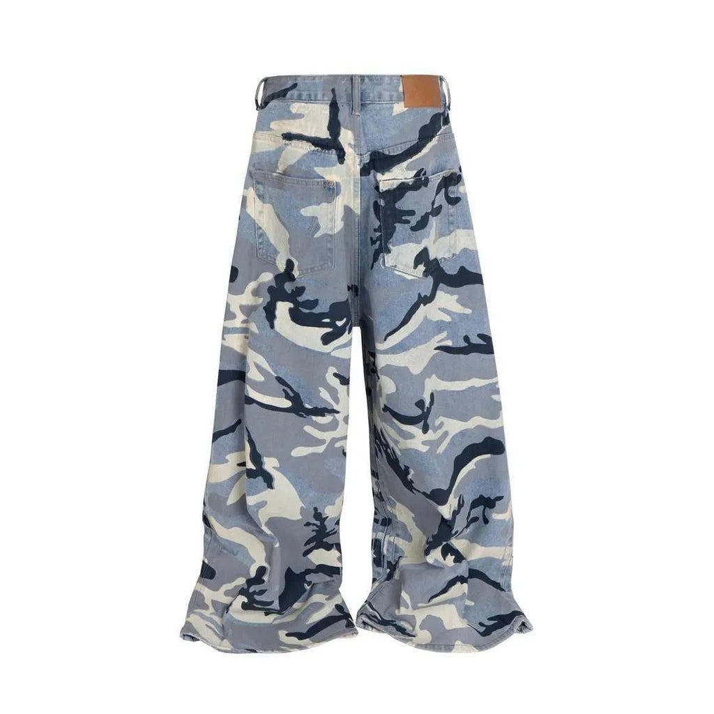 Snow camouflage blue loose fit denim jeans on a neutral background, showing mid-waist and relaxed leg cut.