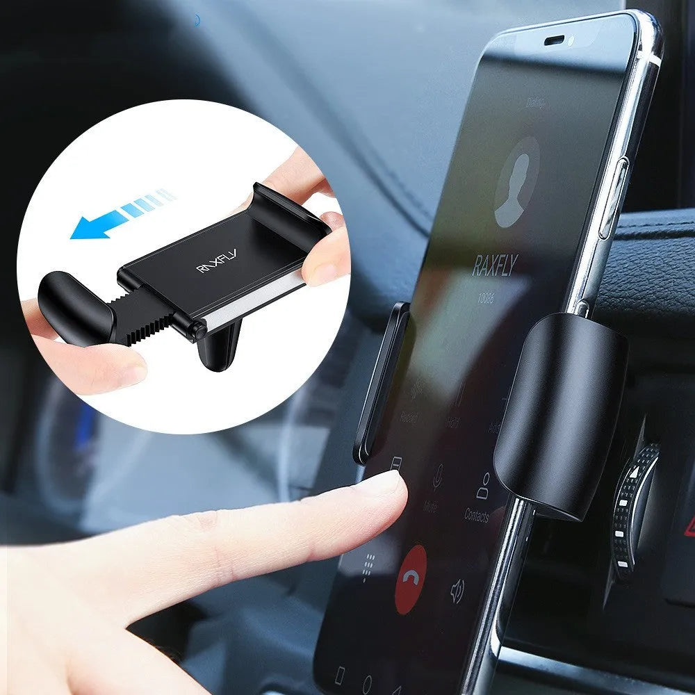 Black universal adjustable car air vent bracket phone holder made from ABS plastic clipped onto a car vent