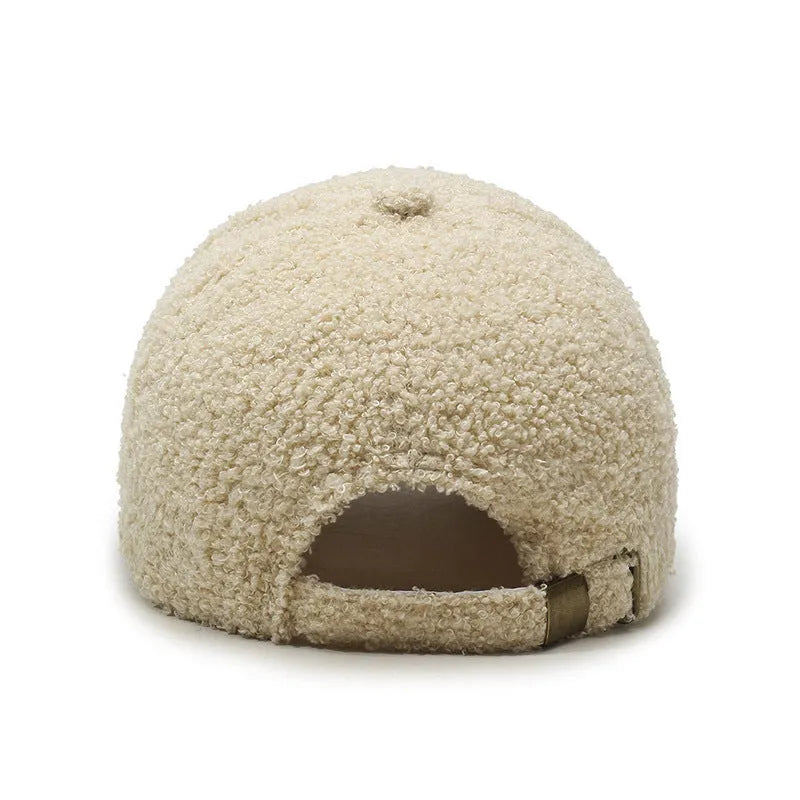 Adjustable winter baseball cap in lambskin polyester fabric showing dome crown design