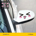 Pair of reflective cartoon eyes car stickers on a white background, showing adhesive backing.