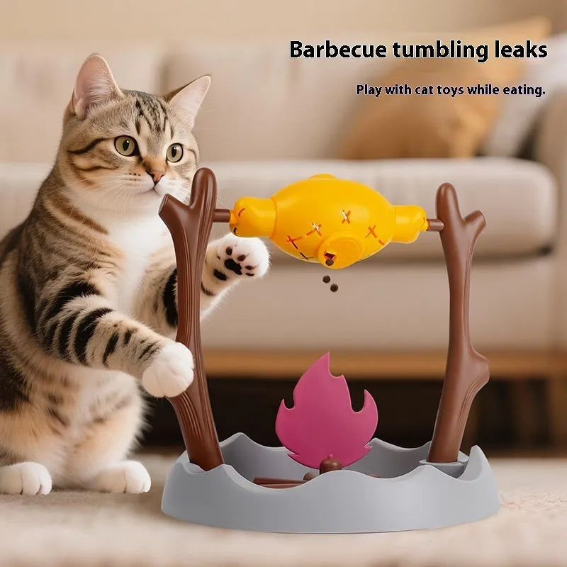 Barbecue-themed tumbling plastic cat food feeder toy for interactive play and slow feeding.