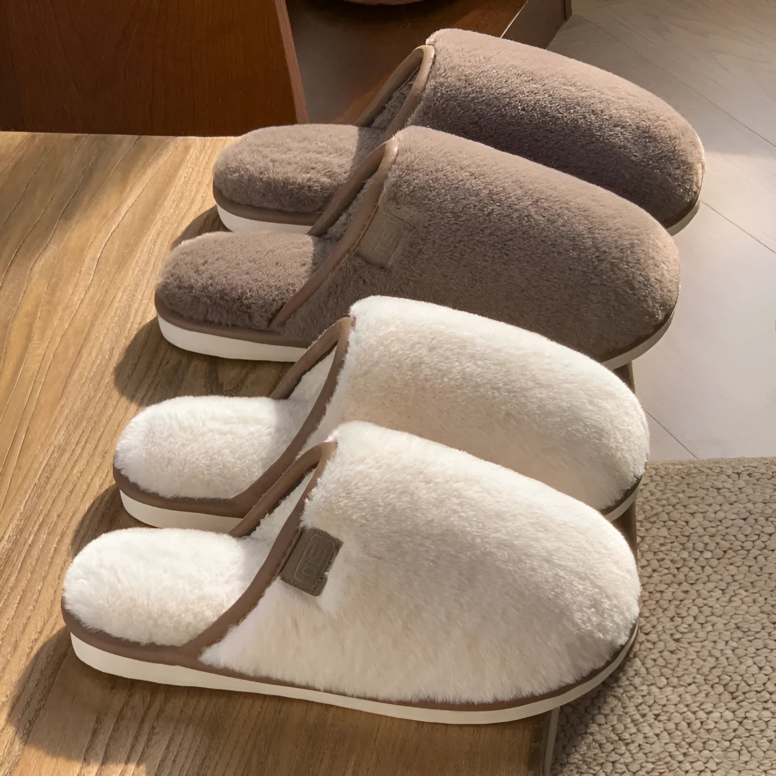 Blue plush PVC winter slipper with non-slip sole and car stitching detail on a wooden floor.