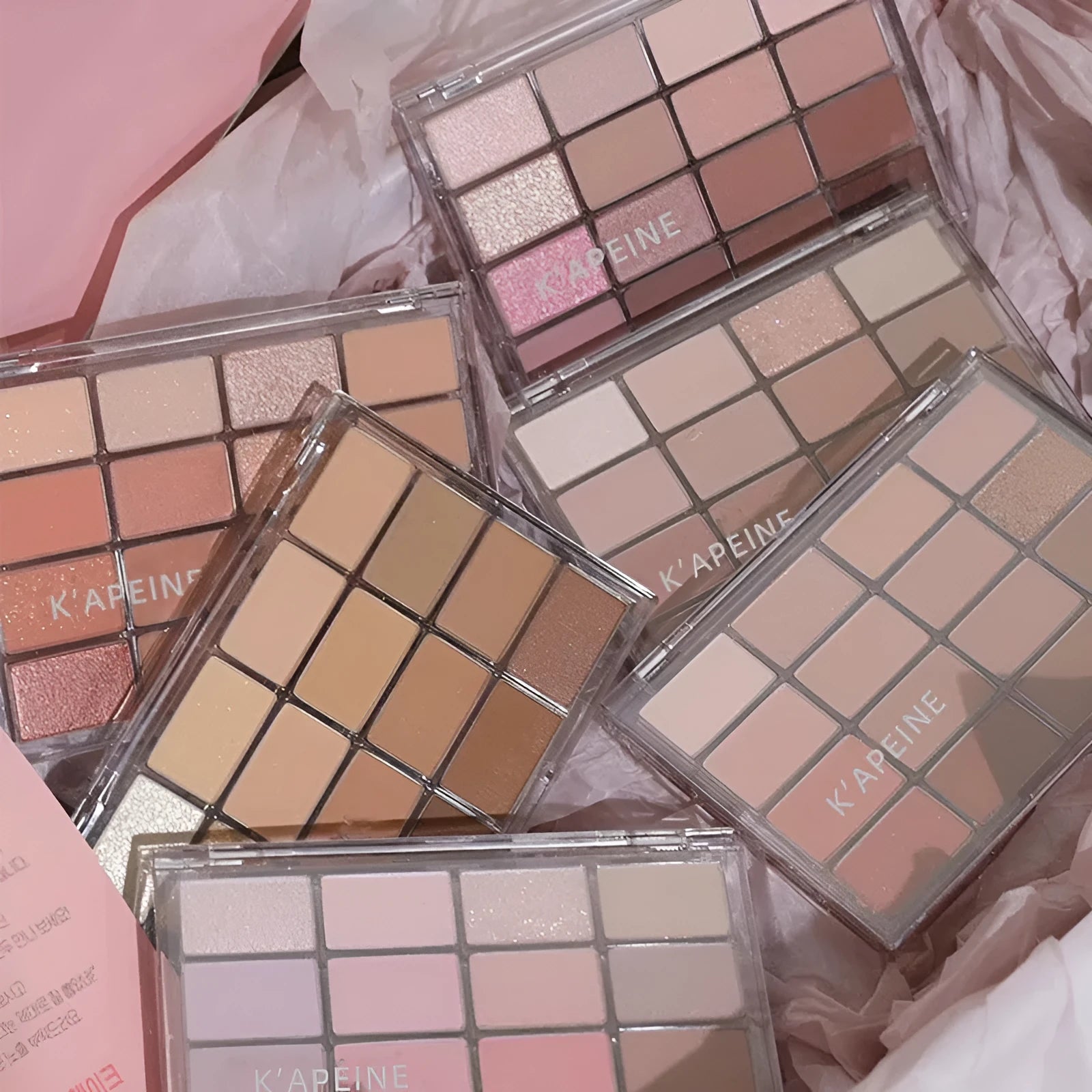 Eyeshadow palette showing 16 colours including shimmer and matte finishes, with shades like life fuzzy and cocoa fuzzy.
