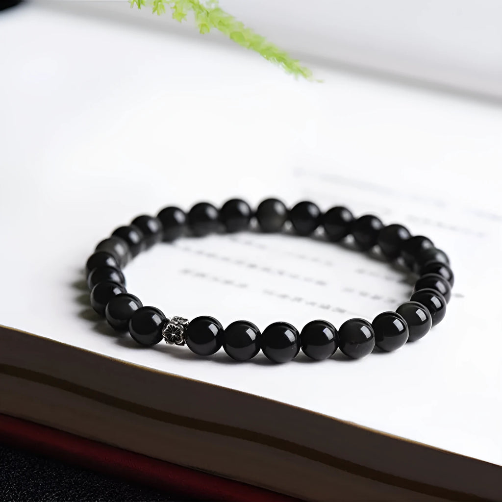 Natural obsidian bracelet with S925 silver flower charm and dragon phoenix constellation design