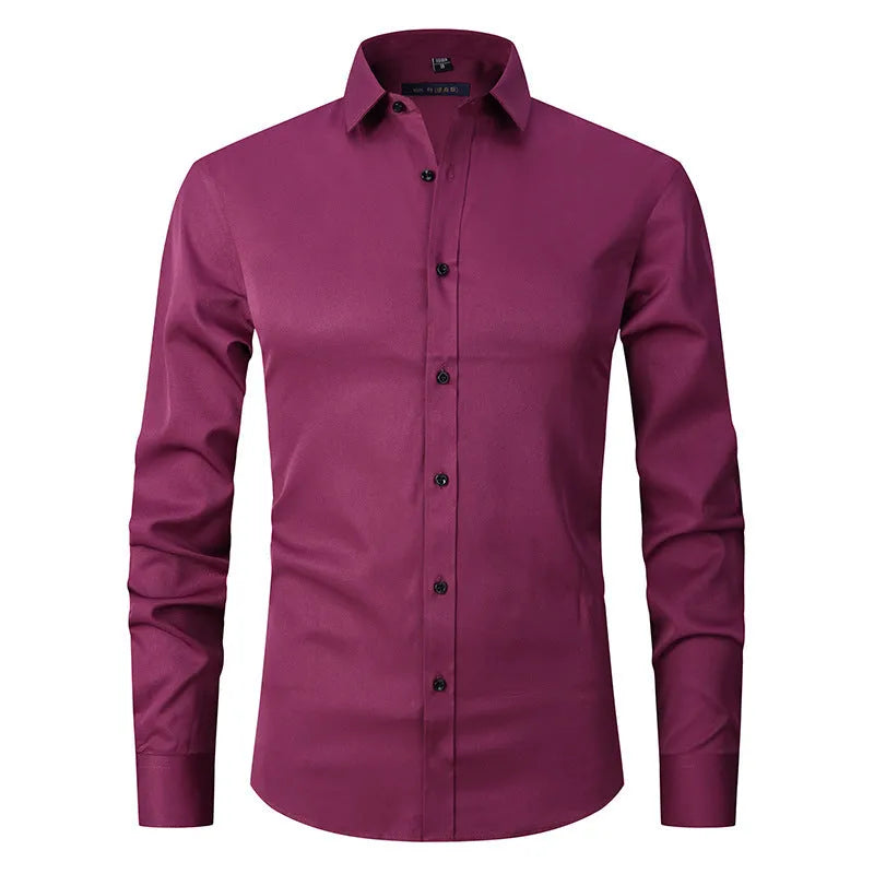 Man wearing a solid-colour stretch long sleeve work shirt made from polyester fabric.